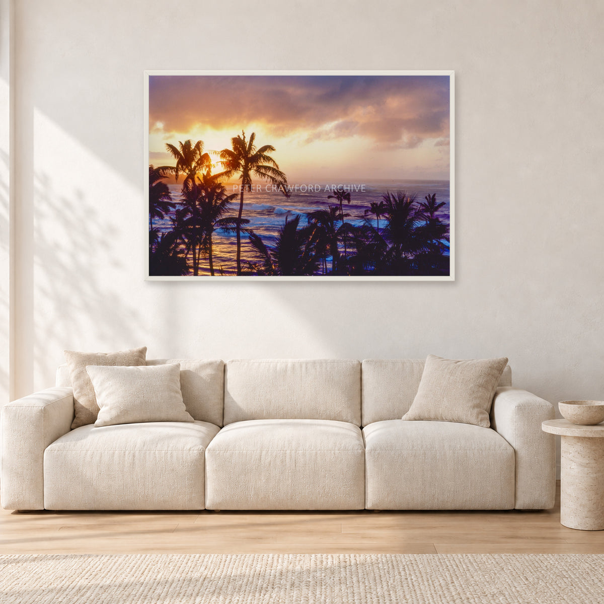 Turtle Bay Dusk by Peter Crawford — 120 × 80 cm, white frame, shown in a light minimalist living room.