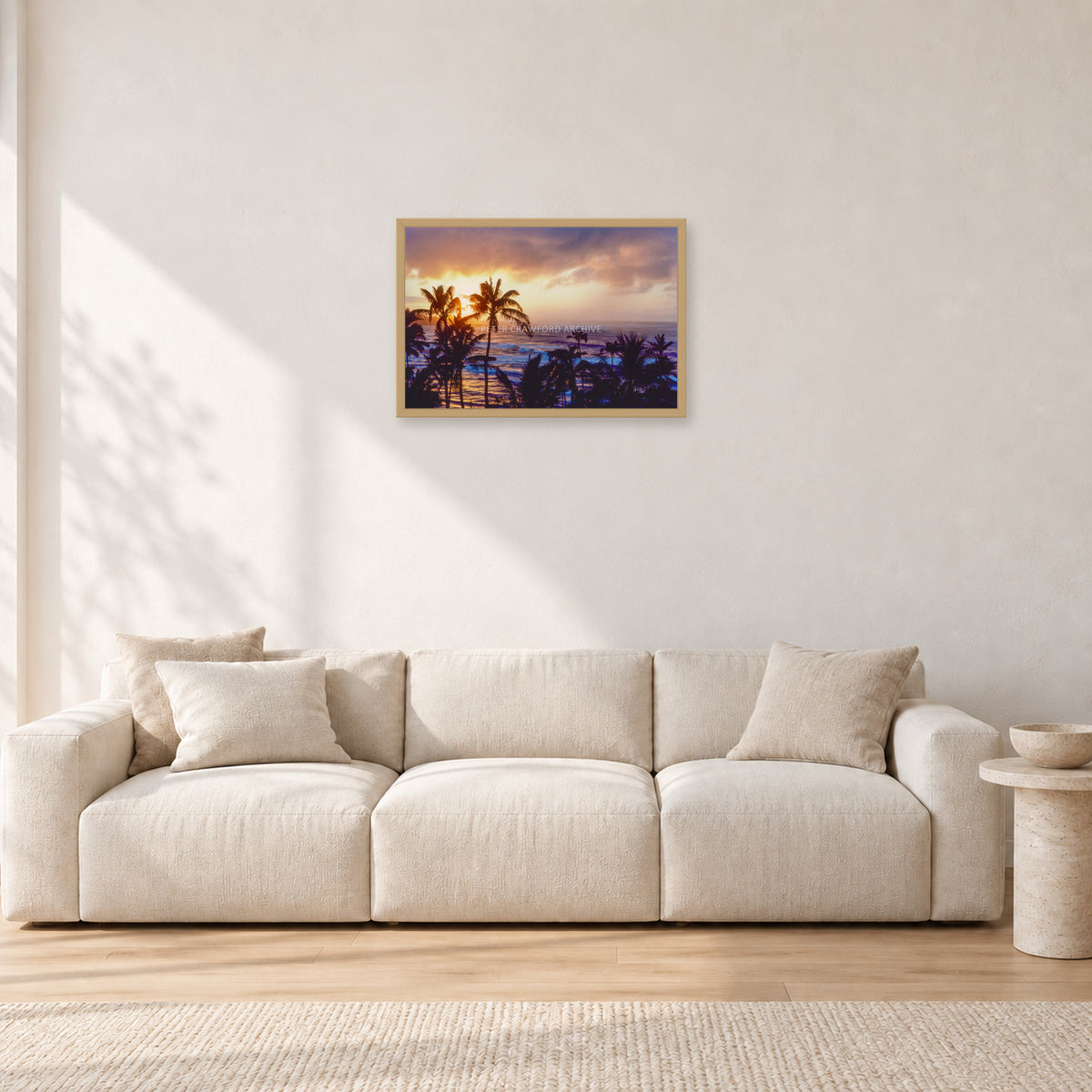 Turtle Bay Dusk by Peter Crawford — 60 × 40 cm, hayseed frame, shown in a light minimalist living room.