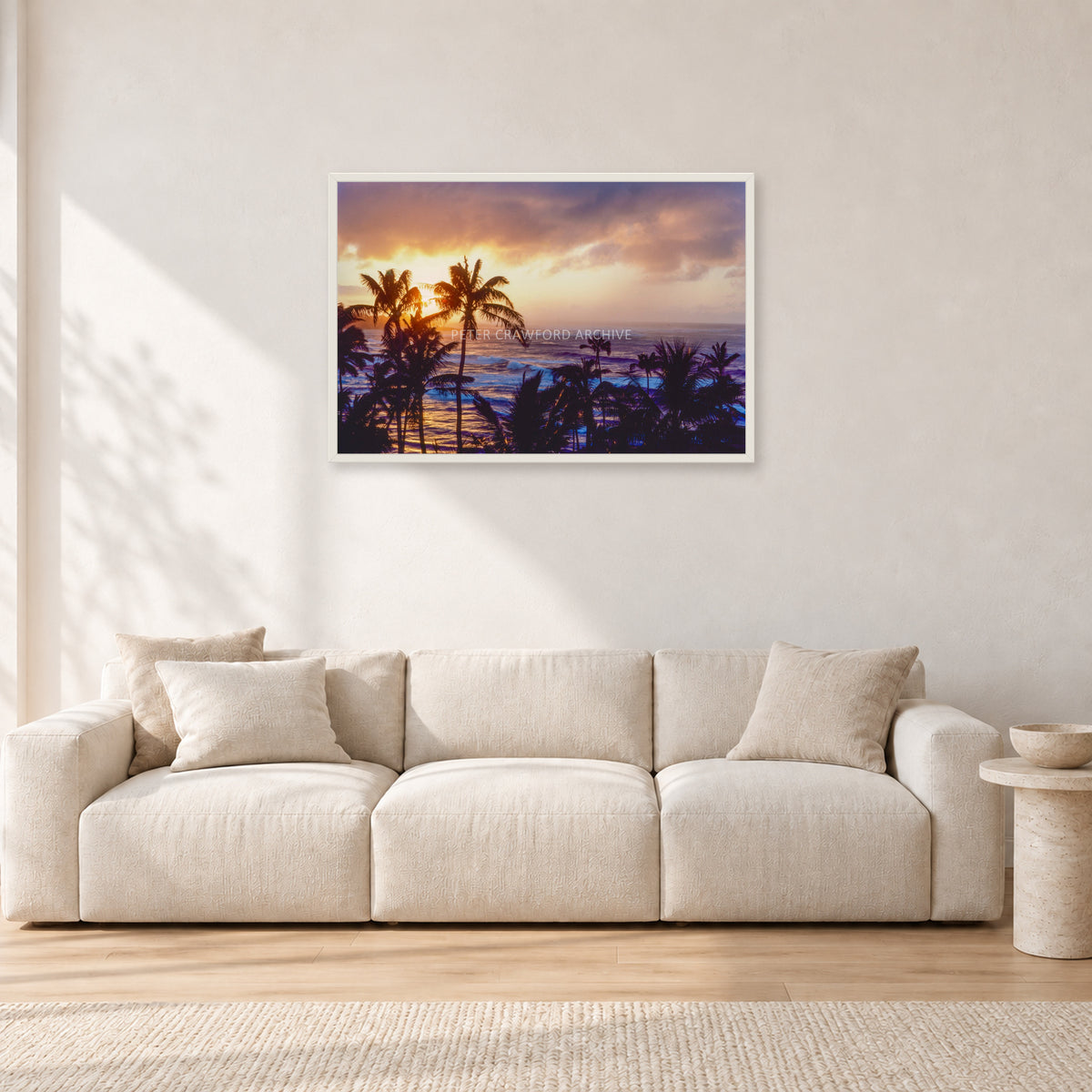Turtle Bay Dusk by Peter Crawford — 90 × 60 cm, white frame, shown in a light minimalist living room.