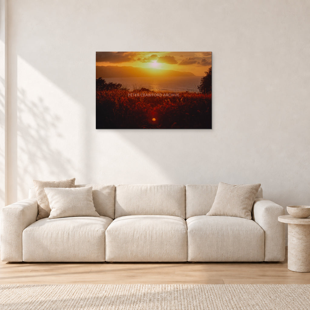 Waimea Dusk by Peter Crawford — 90 × 60 cm, aluminium-mounted resin print, shown in a light minimalist living room.