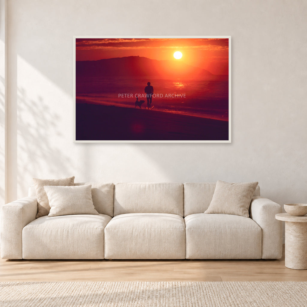 Winter Sun, Collaroy by Peter Crawford — 120 × 80 cm, white frame, shown in a light minimalist living room.