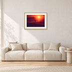 Winter Sun, Collaroy by Peter Crawford — 60 × 40 cm, hayseed frame with white mat, shown in a light minimalist living room.